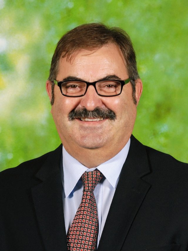 Mr Dennis Garoni